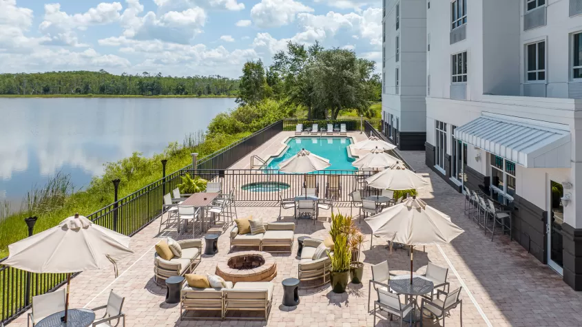 refreshing pool with a lakeview