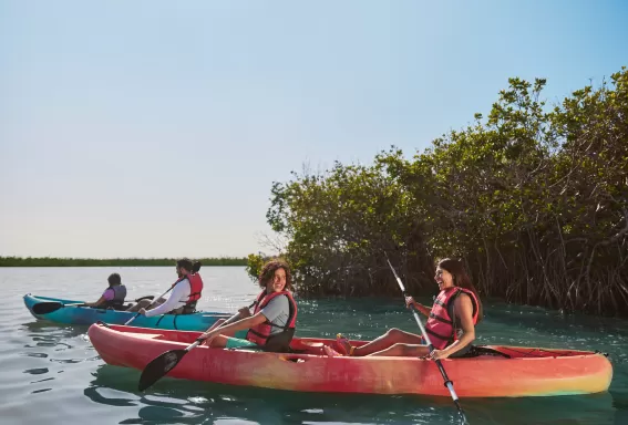 family kayaking 